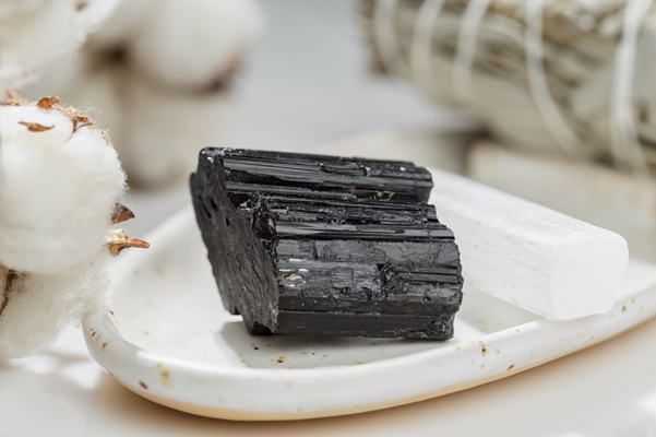 A raw black tourmaline crystal for energy cleansing