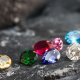 assorted-gemstones-on-rock