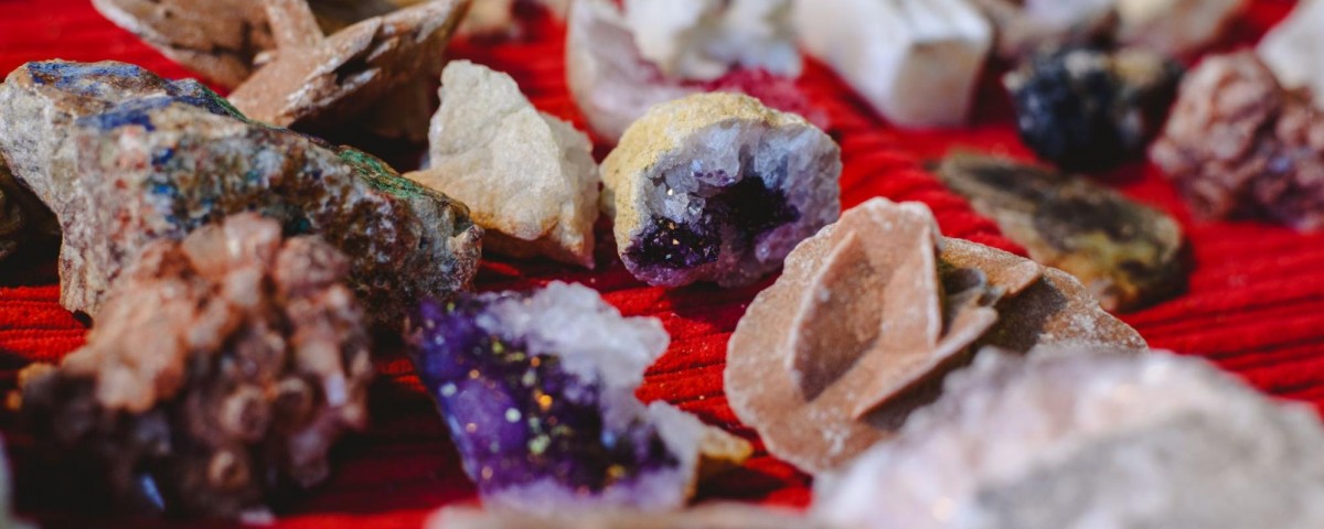 A collection of raw, unpolished crystals.