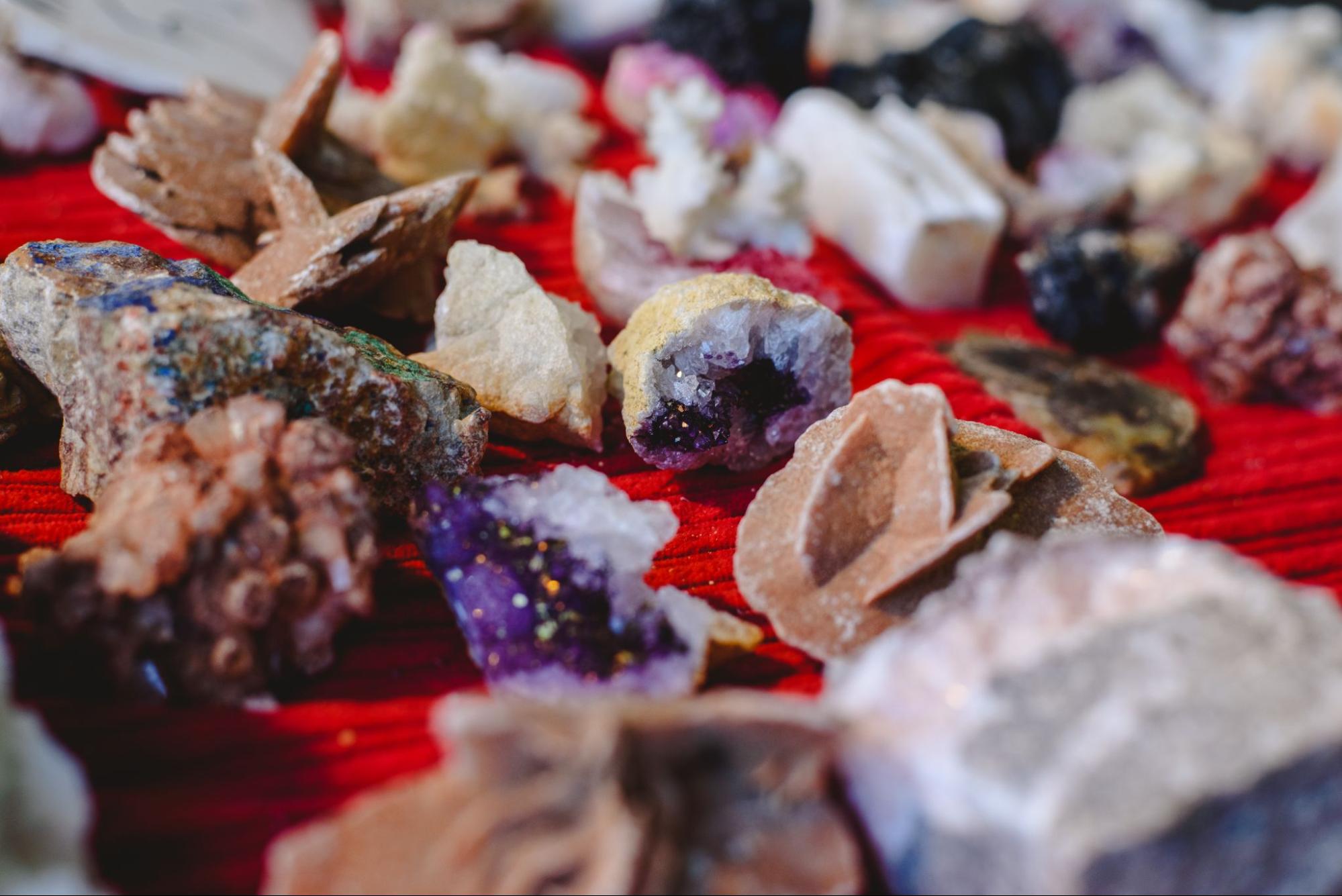 A collection of raw, unpolished crystals.