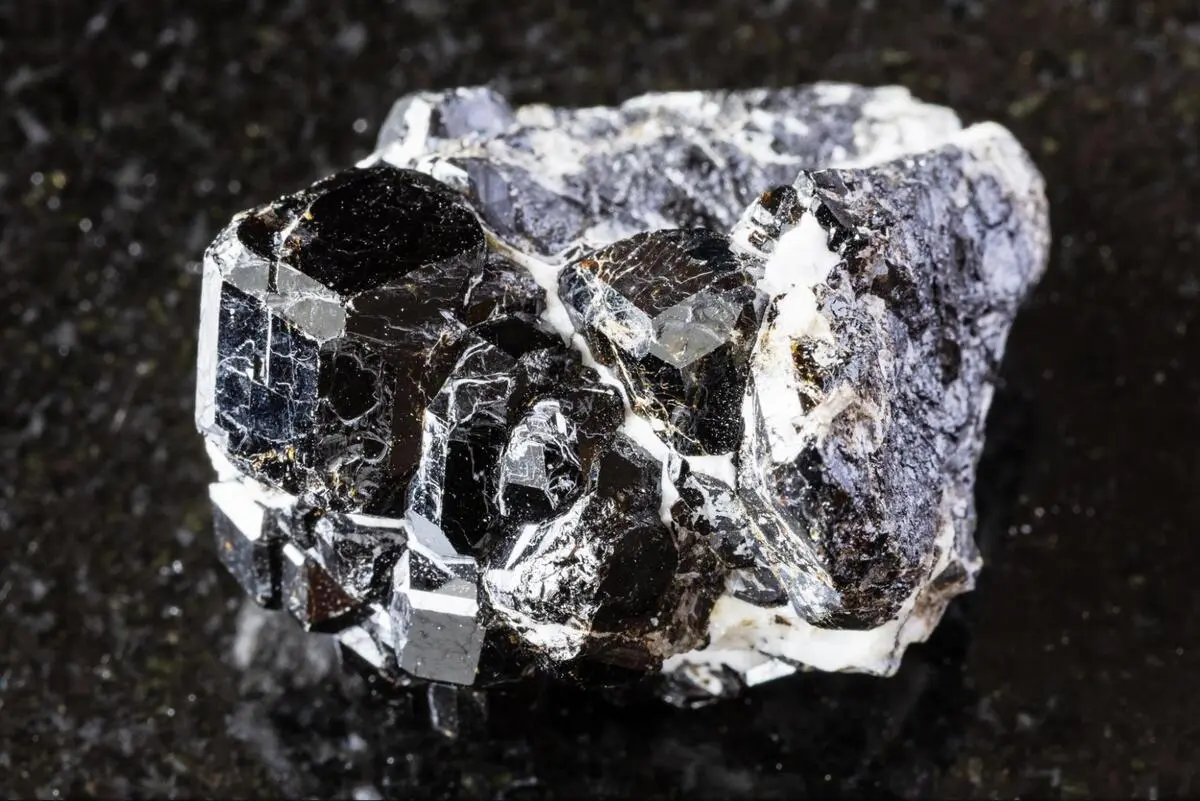 Raw meteorite specimen showing natural black and silver crystalline texture