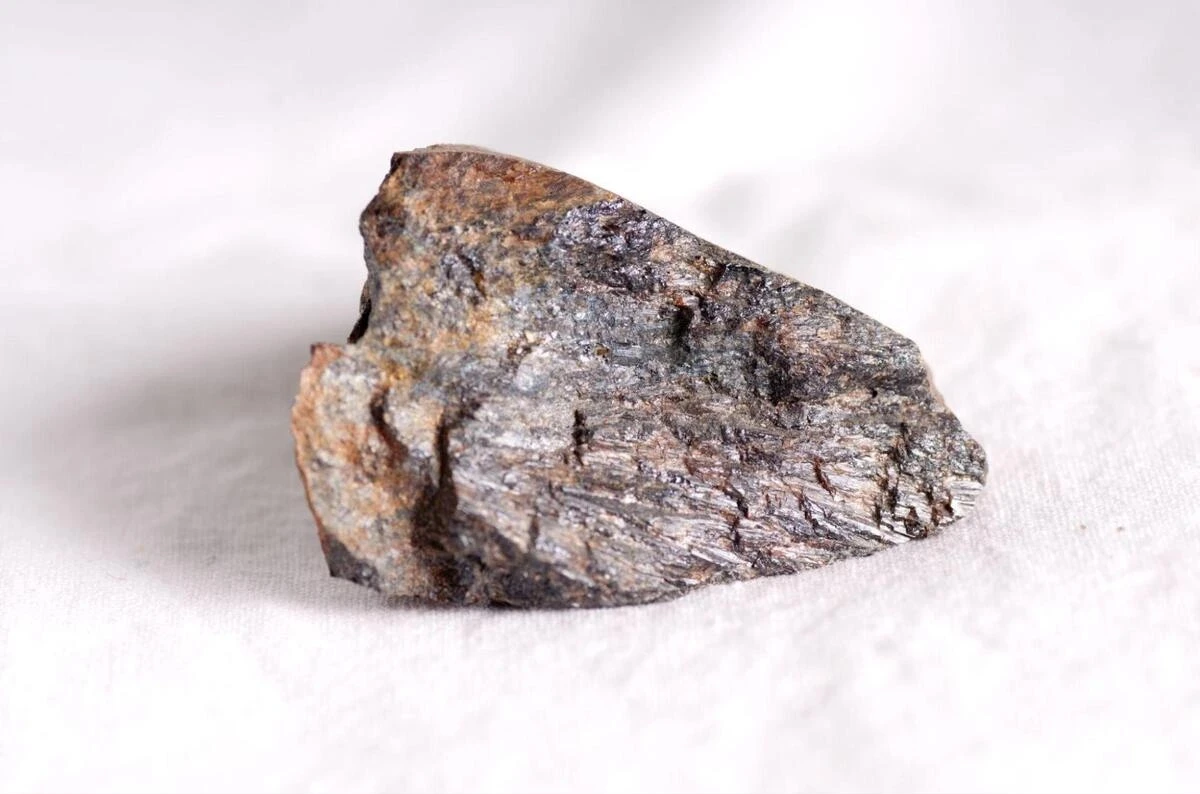 Raw Gibeon Meteorite Before Widmanstätten Patterns Raw Gibeon meteorite sample prior to polishing and etching used to reveal the distinctive Widmanstätten crystal patterns.